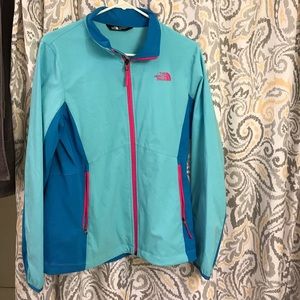 Blue North Face windbreaker jacket